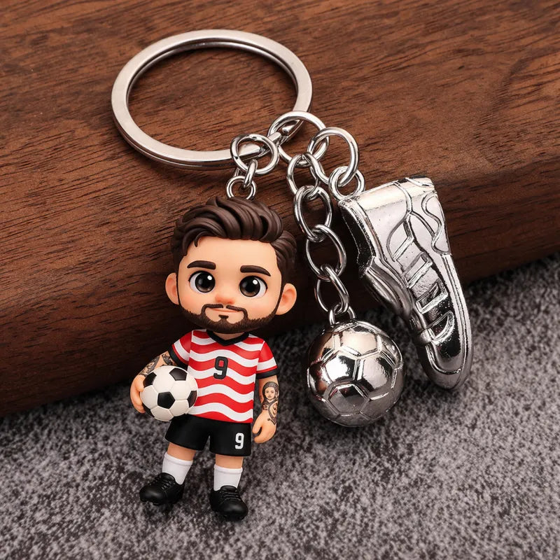 personalized 3D chibi football fan keychain hanging from a set of car keys, demonstrating the durable metal keyring in everyday use